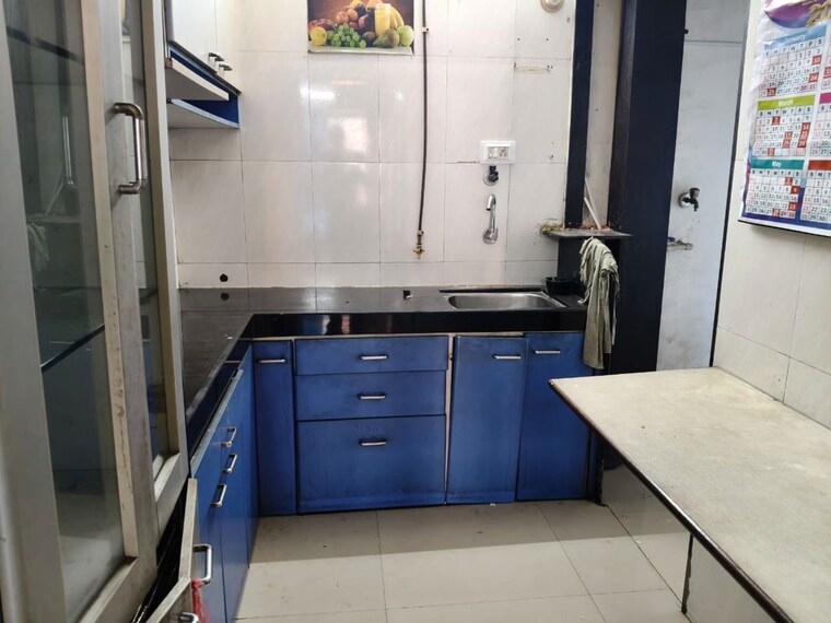 Kitchen, pacific-towers 1 Bedroom 430 Sq.Ft. Apartment In Nerul Sector 27 Navi Mumbai 10423433