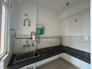 Kitchen in 2.5 BHK Apartment at Ajnara Le Garden, Sector 16b Greater Noida – for Sale