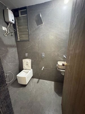 Bathroom in 3.5 BHK Apartment at Rattan Icon, Seawoods Sector 50 – for Rent