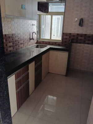 Kitchen in 2 BHK Apartment at Jangid Galaxy, Ghodbunder Road – for Sale