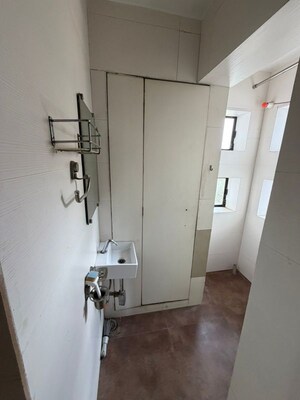 Bathroom in 2 BHK Apartment at Raheja Gardens Aspen, Midc Colony – for Sale