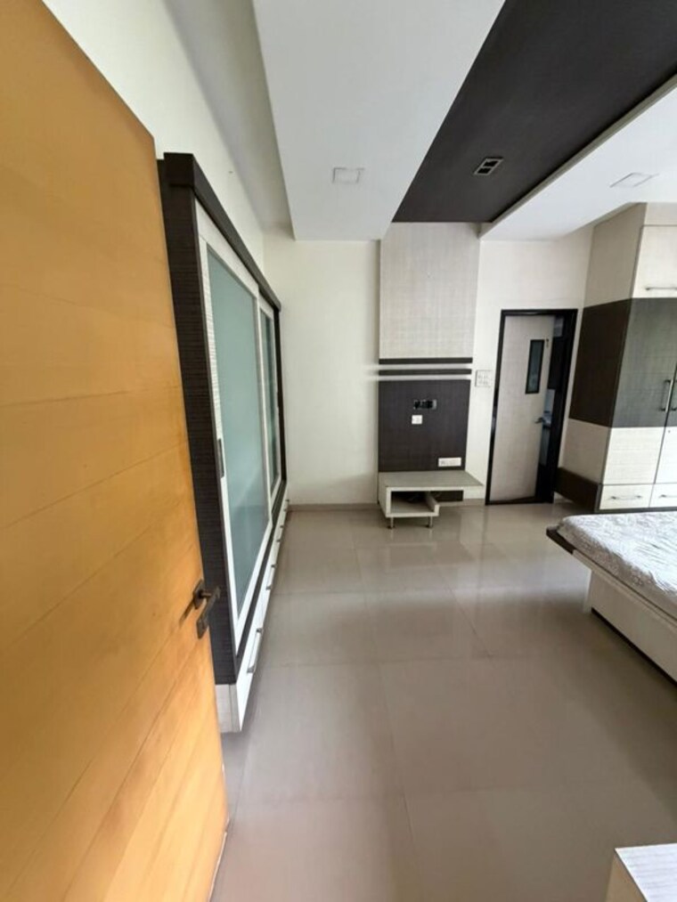 Living Room, raheja-gardens-aspen 2 Bedroom 890 Sq.Ft. Apartment In Midc Colony Thane 10423651