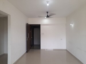 Room in 2 BHK Apartment at Lokhandwala Octacrest, Kandivali East – for Sale