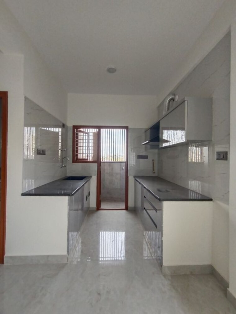 Kitchen, reliaable-lakedew-residency-1 2 Bedroom 1100 Sq.Ft. Builder Floor In Haralur Road Bangalore 10423738