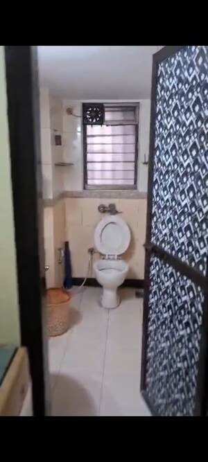 Bathroom in 2 BHK Apartment at Gokul Divine CHS, Vile Parle West – for Rent