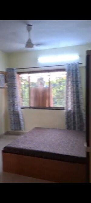Bedroom in 2 BHK Apartment at Gokul Divine CHS, Vile Parle West – for Rent