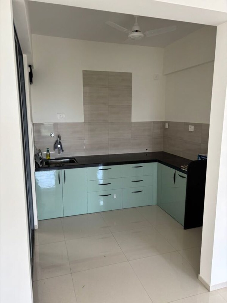 Kitchen, saarrthi-skybay 2 Bedroom 1000 Sq.Ft. Apartment In Mahalunge Pune 10423730