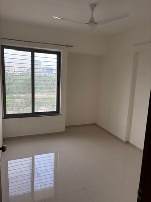 Room in 2 BHK Apartment at Saarrthi Skybay, Mahalunge – for Rent