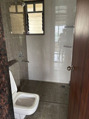 Bathroom in 2 BHK Apartment at Saarrthi Skybay, Mahalunge – for Rent