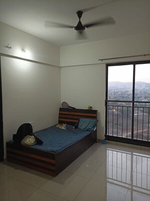 Bedroom in 2 BHK Apartment at Shapoorji Pallonji Joyville Hinjewadi, Hinjewadi – for Rent
