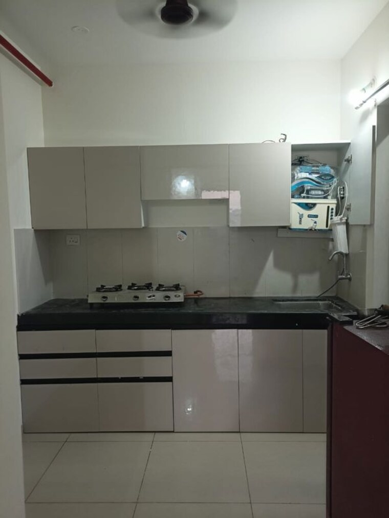 Kitchen, shapoorji-pallonji-joyville-hinjewadi 2 Bedroom 650 Sq.Ft. Apartment In Hinjewadi Pune 10413926