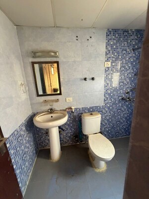 Washroom in 2 BHK Apartment at Aims Golf City, Sector 75 – for Rent