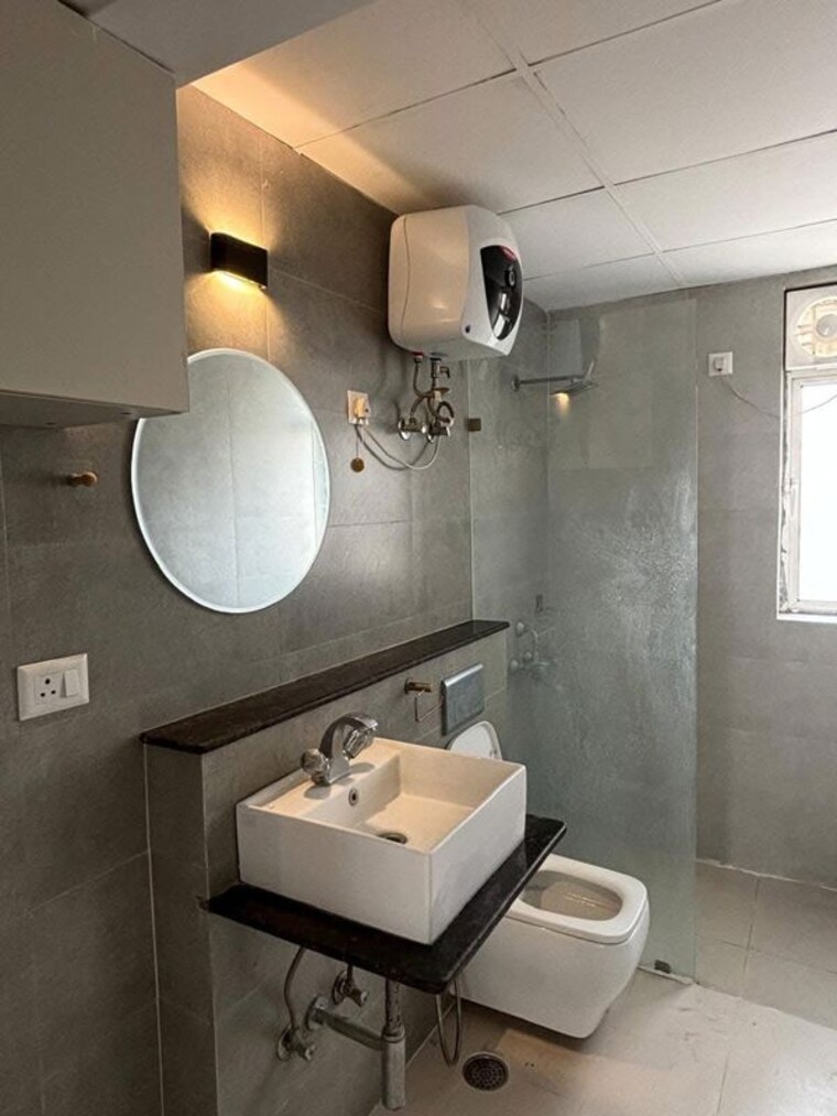 Bathroom, jaypee-greens-kosmos 2.5 Bedroom 1365 Sq.Ft. Apartment In Sector 134 Noida 10423913