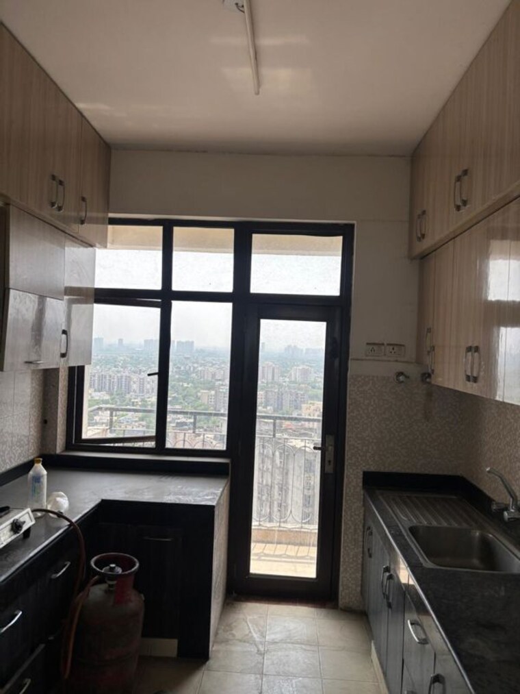 Kitchen, awho-twin-towers-ph4 3 Bedroom 1970 Sq.Ft. Apartment In Omega I Greater Noida Greater Noida 10423964
