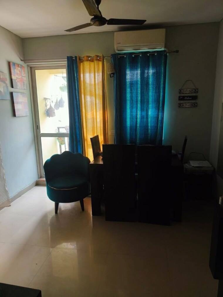 Living Room, jaypee-greens-kosmos 2 Bedroom 950 Sq.Ft. Apartment In Sector 134 Noida 10401714