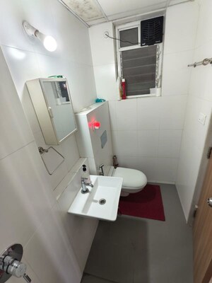 Bathroom in 3 BHK Apartment at Godrej Emerald, Ghodbunder Road – for Rent