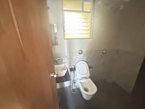 Bathroom in 2 BHK Apartment at Welworth Purnam, Hinjewadi – for Rent