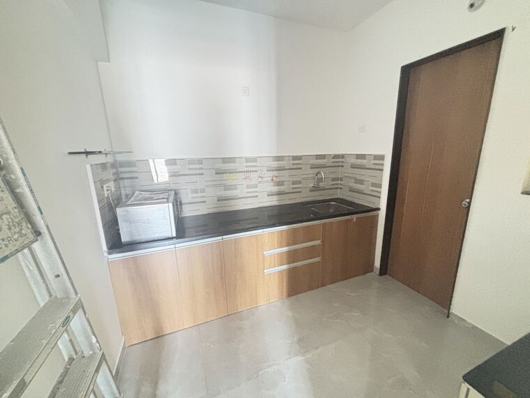 Kitchen, welworth-purnam 2 Bedroom 750 Sq.Ft. Apartment In Hinjewadi Pune 10424015