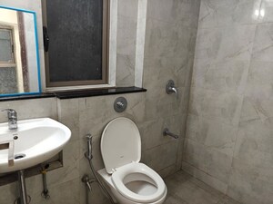 Bathroom in 1 BHK Apartment at Sheth Irene, Malad West – for Rent