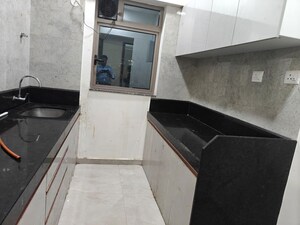 Kitchen in 1 BHK Apartment at Sheth Irene, Malad West – for Rent