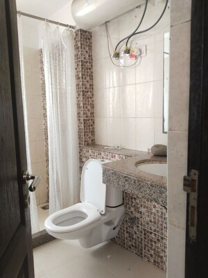 Bathroom in 3 BHK Apartment at Unitech The Residences Sector 33, Sector 33 – for Rent