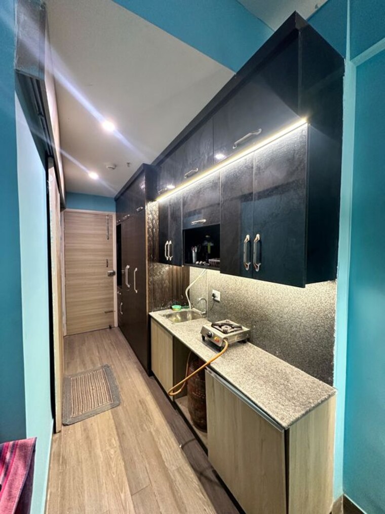 Kitchen, gaur-runway-suites Studio 460 Sq.Ft. Apartment In Gaur Yamuna City Greater Noida 10424290
