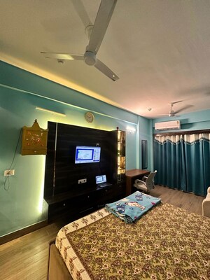 Living Room in Studio Apartment at Gaur Runway Suites, Gaur Yamuna City – for Rent
