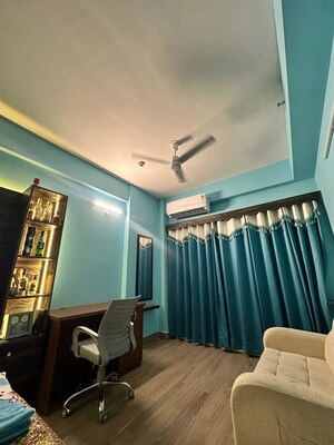 Living Room in Studio Apartment at Gaur Runway Suites, Gaur Yamuna City – for Rent