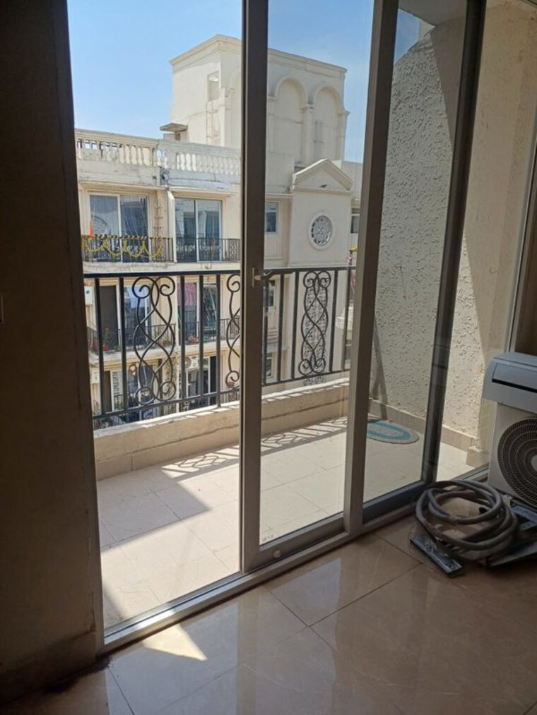 Balcony, pyramid-midtown 2 Bedroom 800 Sq.Ft. Apartment In Sector 59 Gurgaon 10424298