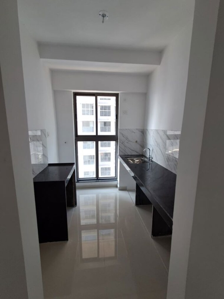 Kitchen/pantry, uk-iridium-tower-2 1 Bedroom 600 Sq.Ft. Apartment In Kandivali East Mumbai 10424371