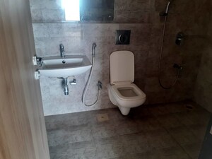 Bathroom in 1 BHK Apartment at Je And Vee Om Trimurti, Malad East – for Rent