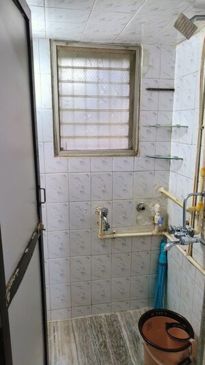 Bathroom in 1 BHK Apartment at Amrapali CHS Santacruz East, Santacruz East – for Rent