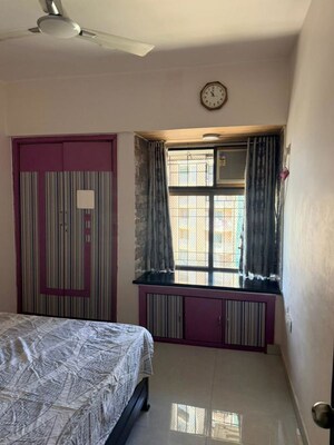 Bedroom in 2 BHK Apartment at Harmony Residency Owale, Owale – for Rent