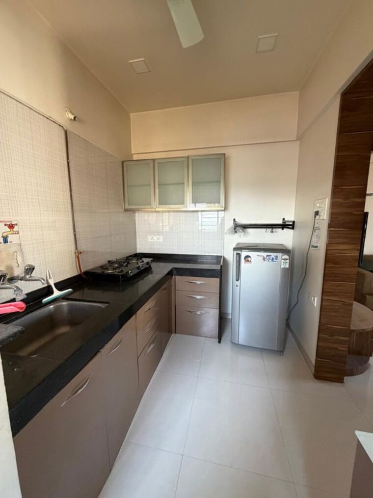 Kitchen, nyati-evita 2 Bedroom 1100 Sq.Ft. Apartment In Dhanori Pune 10424804