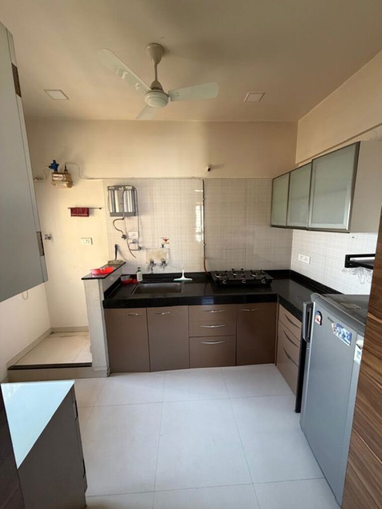 Kitchen, nyati-evita 2 Bedroom 1100 Sq.Ft. Apartment In Dhanori Pune 10424804