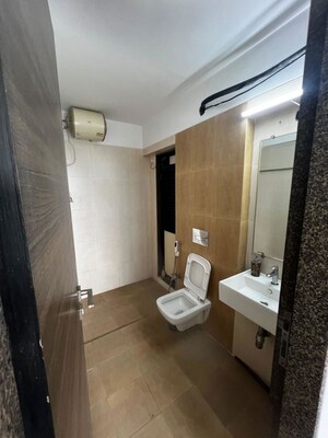 Bathroom in 3 BHK Apartment at Kanakia Rainforest, Andheri East – for Rent