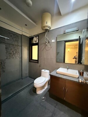 Bathroom in 4 BHK Builder Floor at New Friends Colony – for Rent
