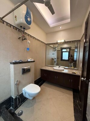 Bathroom in 4 BHK Builder Floor at New Friends Colony – for Rent