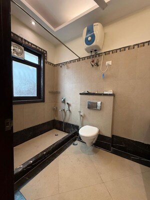 Bathroom in 4 BHK Builder Floor at New Friends Colony – for Rent