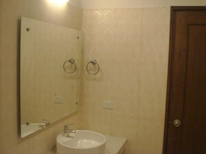 Bathroom in 3 BHK Builder Floor at Pamposh Enclave – for Rent