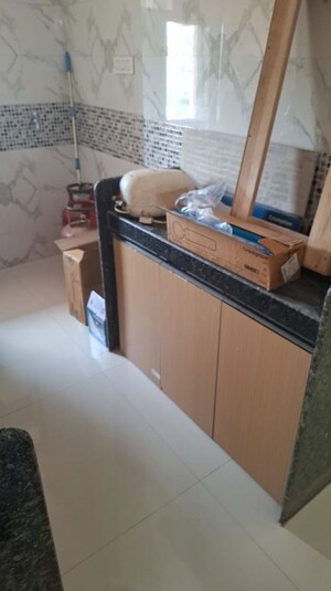 Kitchen in 2 BHK Apartment at DGS Sheetal Tapovan, Malad East – for Rent