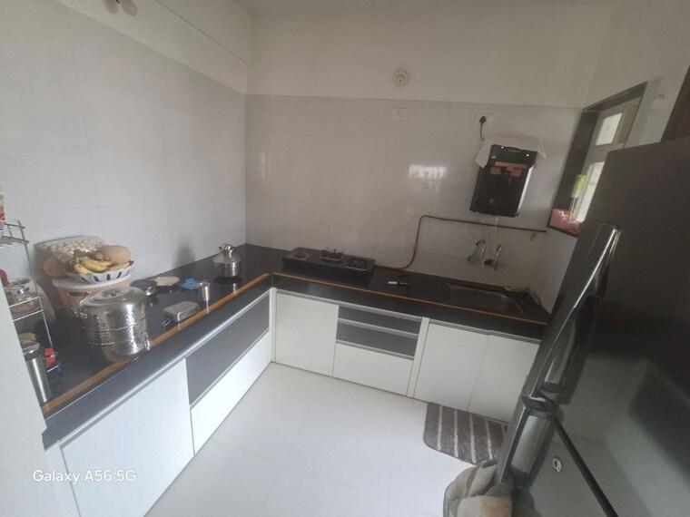 Kitchen, sai-saburi-apartments 2 Bedroom 820 Sq.Ft. Apartment In Kalewadi Pune 10416356