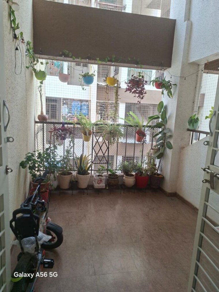Balcony, sai-saburi-apartments 2 Bedroom 820 Sq.Ft. Apartment In Kalewadi Pune 10416356