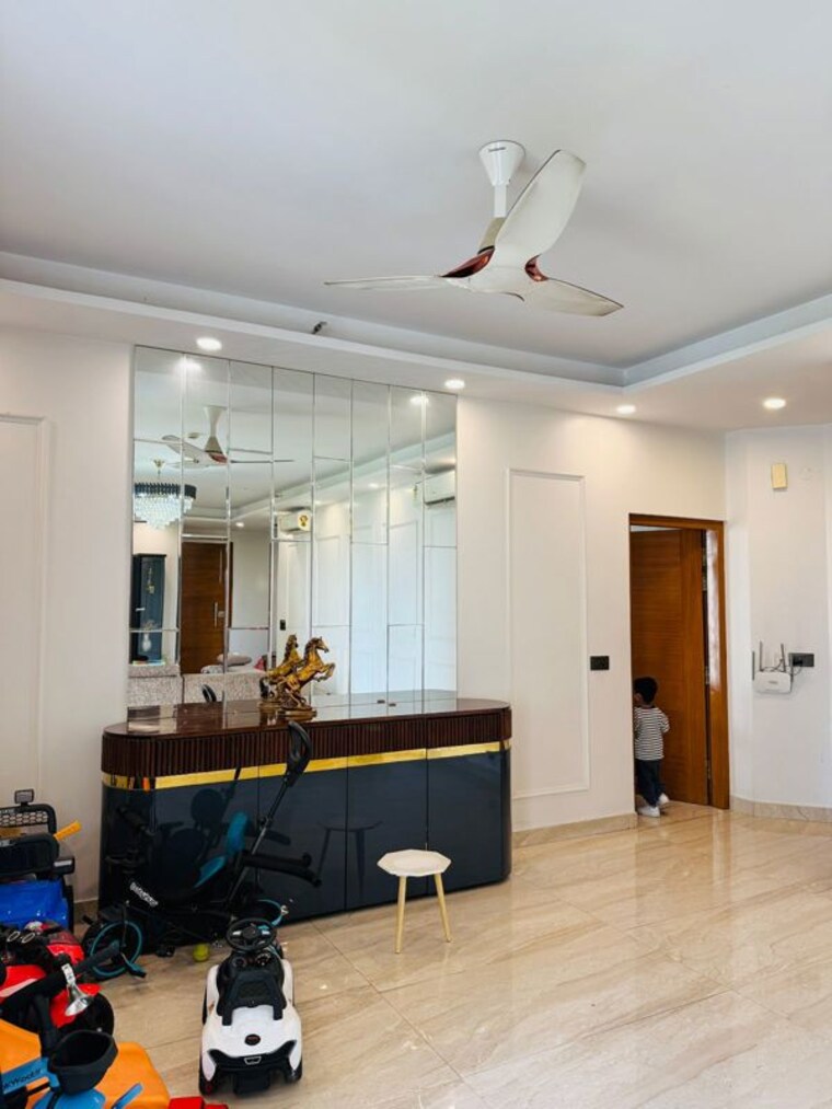 Living Room, jaypee-green-the-star-court 2 Bedroom 1820 Sq.Ft. Apartment In Jaypee Greens Greater Noida 10425056