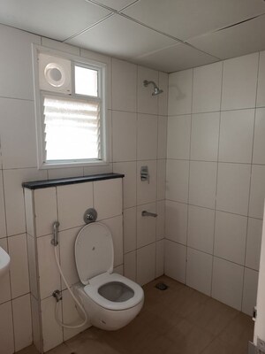 Bathroom in 2 BHK Apartment at Godrej Aqua, International Airport Road – for Rent