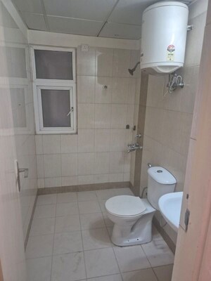 Bathroom in 3 BHK Apartment at Mahindra Aura, Sector 110a – for Rent