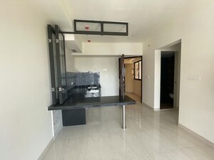 Kitchen in 1 BHK Apartment at Lodha Quality Home Tower 2, Majiwada – for Rent