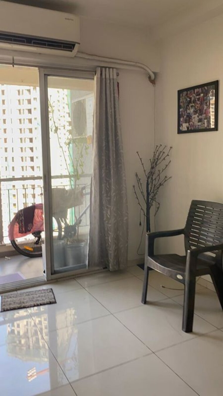 Living Room, godrej-emerald 2 Bedroom 802 Sq.Ft. Apartment In Ghodbunder Road Thane 10423649