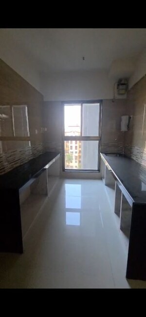 Kitchen in 2 BHK Apartment at Rajesh Raj Infinia, Malad West – for Rent