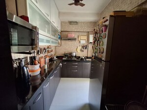 Kitchen in 2.5 BHK Apartment at Chaitanya Aradhana, Andheri West – for Sale